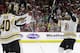 Boston Bruins goalie Tuukka Rask (40), of Finland, celebrates with John Moore following Game 4 of the NHL hockey Stanley Cup Eastern Conference finals against the Carolina Hurricanes in Raleigh, N.C., Thursday, May 16, 2019. Boston won 4-0 to advance to the Stanley Cup Final. (AP Photo/Gerry Broome)