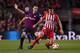 BARCELONA, SPAIN - APRIL 06: Rodri of Atletico Madrid evades Sergio Busquets of Barcelona during the La Liga match between FC Barcelona and Club Atletico de Madrid at Camp Nou on April 06, 2019 in Barcelona, Spain. (Photo by Alex Caparros/Getty Images)
