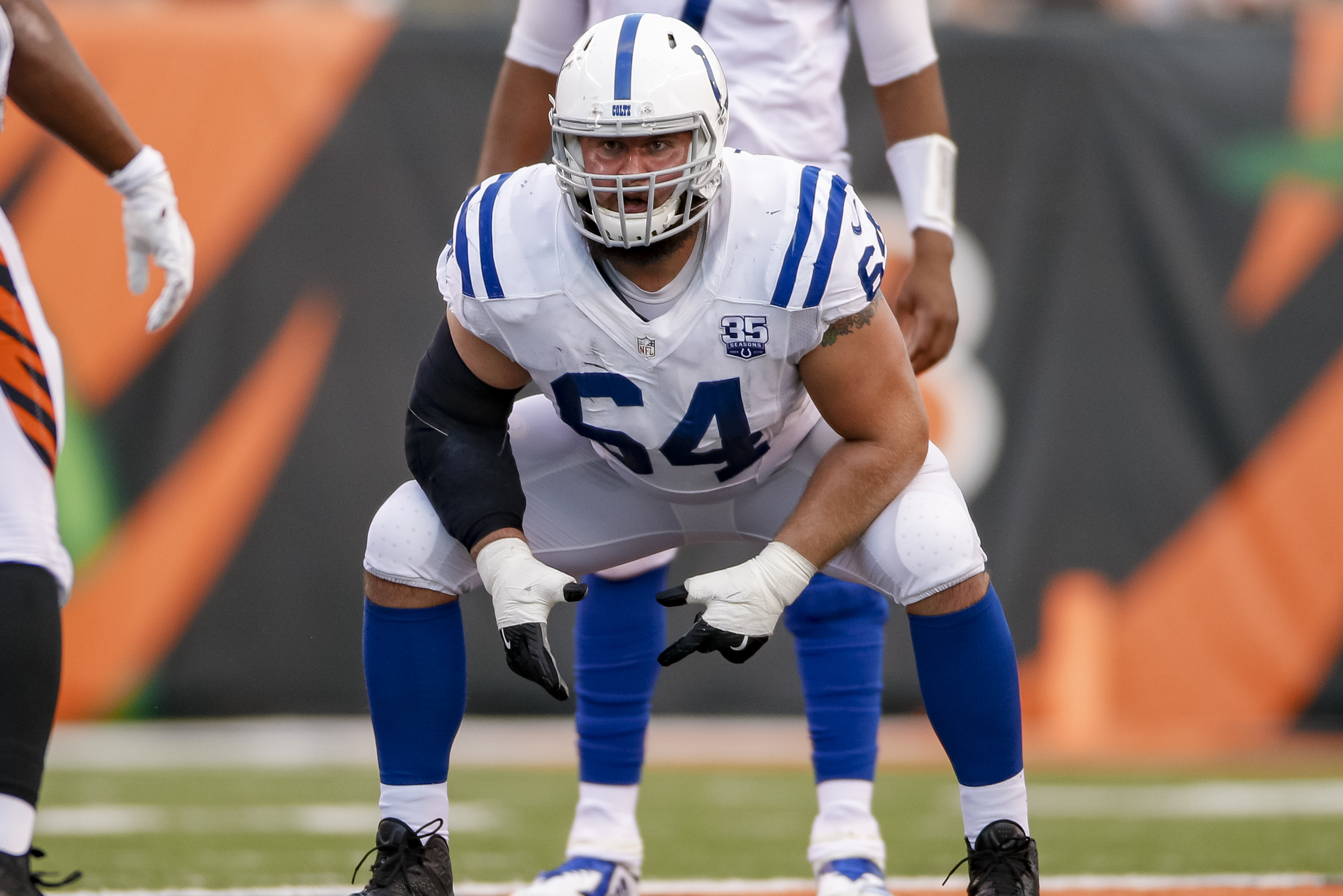 Indianapolis Colts guard Mark Glowinski (64) warms up before an