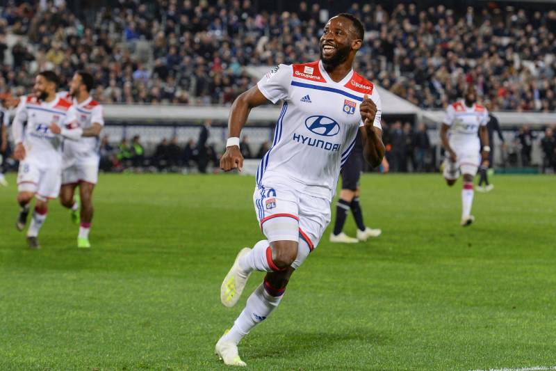 Lyon's French forward Moussa Dembele (C) celebrates after scoring a goal during the French L1 football match between Bordeaux (FCGB) and Lyon (OL) on April 26, 2019 at the Matmut Atlantique stadium in Bordeaux, southwestern France. (Photo by NICOLAS TUCAT / AFP) (Photo credit should read NICOLAS TUCAT/AFP/Getty Images)