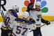 St. Louis Blues' Ryan O'Reilly (90), David Perron (57), celebrate with Jaden Schwartz (17), who scored a goal against the San Jose Sharks in the third period in Game 5 of the NHL hockey Stanley Cup Western Conference finals in San Jose, Calif., on Sunday, May 19, 2019. (AP Photo/Josie Lepe)