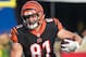 ORCHARD PARK, NY - AUGUST 26: Tyler Kroft #81 of the Cincinnati Bengals runs with the ball during the preseason game against the Buffalo Bills at New Era Field on August 26, 2018 in Orchard Park, New York. Cincinnati defeats Buffalo 26-13 in the preseason matchup. (Photo by Brett Carlsen/Getty Images)