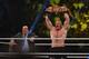 Brock Lesnar celebrates, with his manager Paul Heyman, after winning the WWE Universal Championship match as part of as part of the World Wrestling Entertainment (WWE) Crown Jewel pay-per-view at the King Saud University Stadium in Riyadh on November 2, 2018. (Photo by Fayez Nureldine / AFP) (Photo credit should read FAYEZ NURELDINE/AFP/Getty Images)