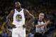 Golden State Warriors' Kevin Durant, left, walks away from referee Ken Mauer during the first half of Game 5 of the team's second-round NBA basketball playoff series against the Houston Rockets on Wednesday, May 8, 2019, in Oakland, Calif. (AP Photo/Ben Margot)