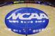 FILE - In this March 21, 2013, file photo taken with a fisheye lens, the NCAA logo is displayed at mid-court before Albany's practice for a second-round game of the NCAA college basketball tournament in Philadelphia. A judge has ruled against the NCAA in a federal antitrust lawsuit, saying football and basketball players should be permitted to receive more compensation from schools but only if the benefits are tied to education. (AP Photo/Matt Slocum, File)
