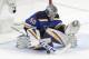St. Louis Blues goaltender Jordan Binnington blocks a shot against the San Jose Sharks during the third period in Game 6 of the NHL hockey Stanley Cup Western Conference final series Tuesday, May 21, 2019, in St. Louis. (AP Photo/Tom Gannam)