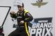 Simon Pagenaud, of France, celebrates after winning the Indy GP IndyCar auto race at Indianapolis Motor Speedway, Saturday, May 11, 2019, in Indianapolis. (AP Photo/Michael Conroy)