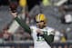 Green Bay Packers quarterback Aaron Rodgers (12) warms up before an NFL football game against the Chicago Bears Sunday, Dec. 16, 2018, in Chicago. (AP Photo/David Banks)