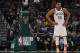 Milwaukee Bucks' Giannis Antetokounmpo pauses during the first half of Game 2 of the NBA Eastern Conference basketball playoff finals against the Toronto Raptors Friday, May 17, 2019, in Milwaukee. (AP Photo/Morry Gash)