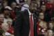 Wisconsin interim Greg Gard, center, and new assistant coach Howard Moore, left, during the first half of an NCAA college basketball game against Green Bay Wednesday, Dec. 23, 2015, in Madison, Wis. (AP Photo/Andy Manis)