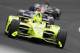 Simon Pagenaud, of France, leads a pack through the first turn during the Indianapolis 500 IndyCar auto race at Indianapolis Motor Speedway, Sunday, May 26, 2019, in Indianapolis. (AP Photo/Darron Cummings)