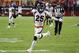 FILE- In this Oct. 18, 2018, file Denver Broncos cornerback Chris Harris Jr. (25) celebrates his interception for a touchdown against the Arizona Cardinals during the first half of an NFL football game in Glendale, Ariz. With Denver out of playoff contention and facing a slew of injuries at the position, the Broncos placed star cornerback Chris Harris Jr. on injured reserve and signed free agent Craig Mager, who was released by the Chargers earlier this season. Harris sustained a chip fracture in his lower right leg two weeks ago. (AP Photo/Rick Scuteri, File)