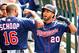 ANAHEIM, CA - MAY 23: Eddie Rosario #20 is congratulated in the dugout by Jonathan Schoop #16 of the Minnesota Twins after hitting a solo home run in the seventh inning against the Los Angeles Angels of Anaheim at Angel Stadium of Anaheim on May 23, 2019 in Anaheim, California. (Photo by Jayne Kamin-Oncea/Getty Images)