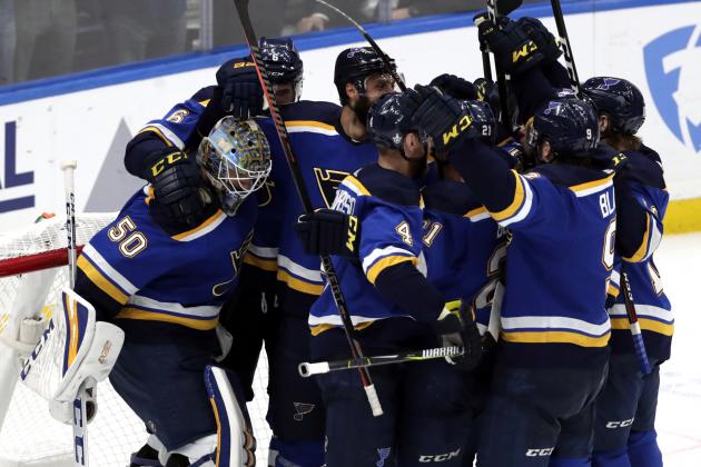 Members of the St. Louis Blues celebrate after defeating the San Jose Sharks 5-1 in Game 6 of the NHL hockey Stanley Cup Western Conference final series Tuesday, May 21, 2019, in St. Louis. (AP Photo/Tom Gannam)