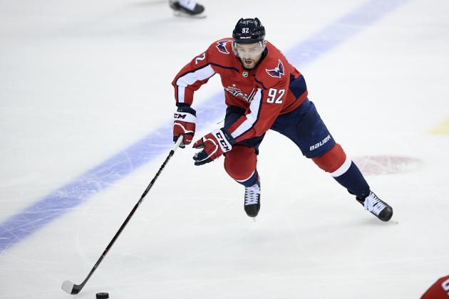 Washington Capitals center Evgeny Kuznetsov (92), of Russia, skates with the puck during the third period of Game 5 of an NHL hockey first-round playoff series against the Carolina Hurricanes, Saturday, April 20, 2019, in Washington. The Capitals won 6-0. (AP Photo/Nick Wass)