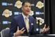 FILE - In this July 11, 2018, file photo, Los Angeles Lakers general manager Rob Pelinka speaks at a news conference at the NBA basketball team's headquarters in El Segundo, Calif. The Lakers say they have mutually agreed to part ways with coach Luke Walton after three losing seasons. Pelinka announced Walton's departure Friday, April 12, 2019. (AP Photo/Reed Saxon, File)