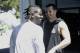 Oakland Raiders wide receiver Antonio Brown, left, speaks with quarterback Derek Carr after an official team activity at the NFL football team's headquarters in Alameda, Calif., Tuesday, May 28, 2019. (AP Photo/Jeff Chiu)