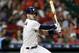 HOUSTON, TEXAS - MAY 22: Carlos Correa #1 of the Houston Astros doubles in a run in the fourth inning against the Chicago White Sox at Minute Maid Park on May 22, 2019 in Houston, Texas. (Photo by Bob Levey/Getty Images)