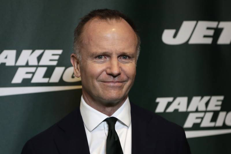 New York Jets owner Christopher Johnson poses for photographers on the green carpet ahead of an event unveiling the team's new NFL football uniforms, Thursday, April 4, 2019, in New York. (AP Photo/Julio Cortez)
