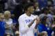Duke forward Cam Reddish applauds from the bench during an NCAA men's college East Regional semifinal basketball game against Virginia Tech in Washington, Friday, March 29, 2019. (AP Photo/Alex Brandon)