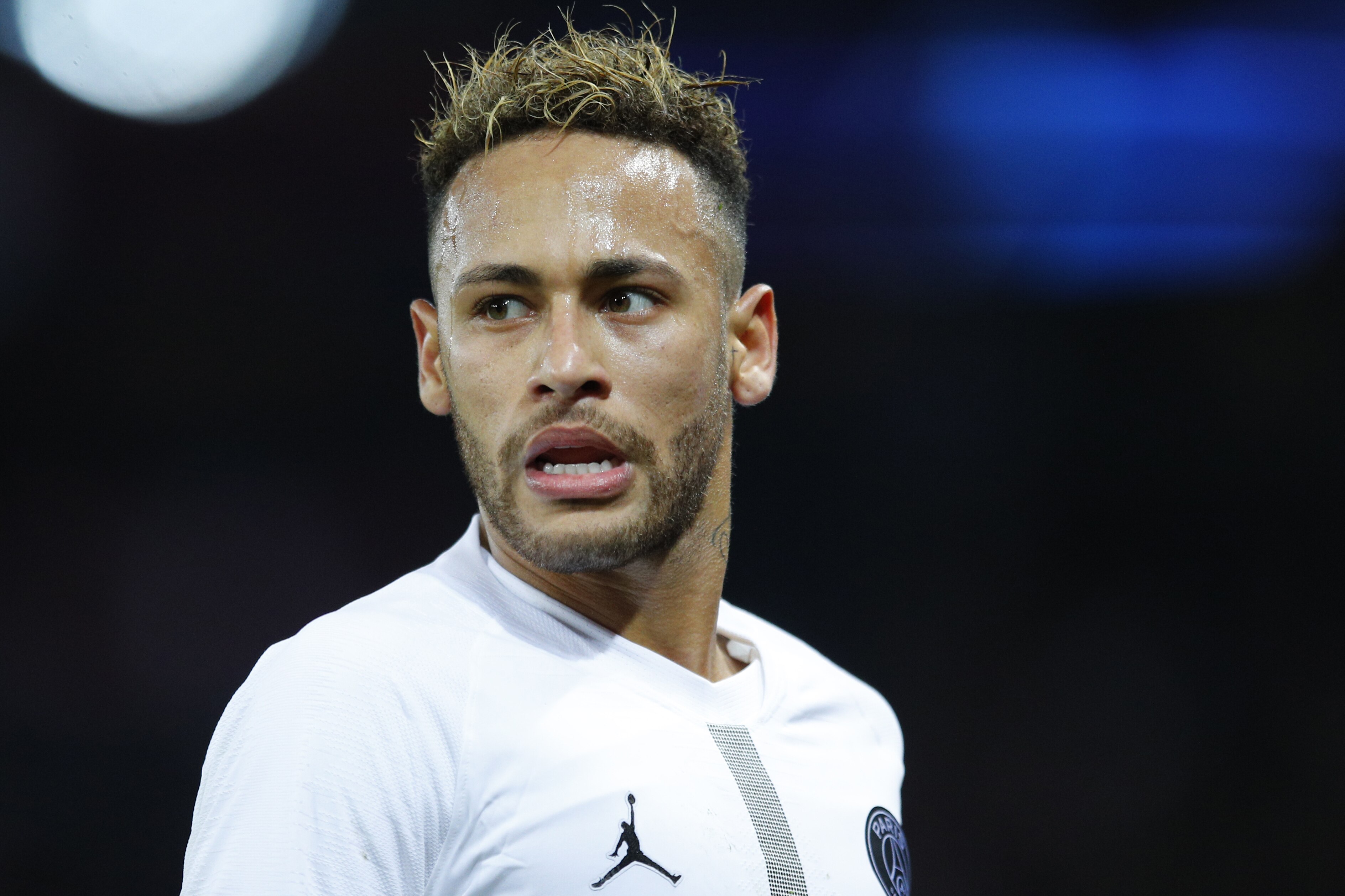PSG forward Neymar grimaces during a Champions League Group C soccer match between Paris Saint Germain and Liverpool at the Parc des Princes stadium in Paris, Wednesday, Nov. 28, 2018. (AP Photo/Francois Mori)