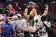 ATLANTA, GA - FEBRUARY 03: Tom Brady #12 of the New England Patriots celebrates with daughter Vivian who raises the Vince Lombardi Trophy after Super Bowl LIII at Mercedes-Benz Stadium on February 3, 2019 in Atlanta, Georgia. The New England Patriots defeat the Los Angeles Rams 13-3. (Photo by Mike Ehrmann/Getty Images)