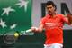 Serbia's Novak Djokovic returns the ball to Germany's Jan-Lennard Struff during their men's singles fourth round match on day nine of The Roland Garros 2019 French Open tennis tournament in Paris on June 3, 2019. (Photo by Christophe ARCHAMBAULT / AFP) (Photo credit should read CHRISTOPHE ARCHAMBAULT/AFP/Getty Images)