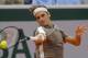 Switzerland's Roger Federer plays a shot against Switzerland's Stan Wawrinka during their quarterfinal match of the French Open tennis tournament at the Roland Garros stadium in Paris, Tuesday, June 4, 2019. (AP Photo/Michel Euler)