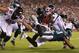 PHILADELPHIA, PA - SEPTEMBER 06: Jordan Hicks #58 and Kamu Grugier-Hill #54 of the Philadelphia Eagles tackle Devonta Freeman #24 of the Atlanta Falcons short of the goal line during the first half at Lincoln Financial Field on September 6, 2018 in Philadelphia, Pennsylvania. (Photo by Mitchell Leff/Getty Images)