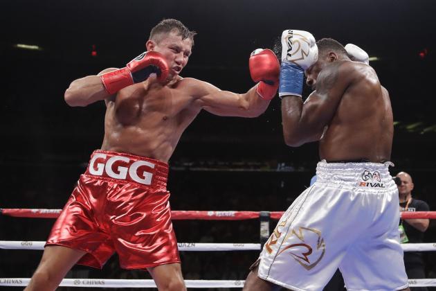 Kazakhstan's Gennady Golovkin, left, punches Canada's Steve Rolls during the fourth round of a super middleweight boxing match Saturday, June 8, 2019, in New York. Golovkin stopped Rolls in the fourth round. (AP Photo/Frank Franklin II)