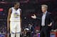 Golden State Warriors coach Steve Kerr, right, talks to forward Kevin Durant during the first half in Game 3 of the team's first-round NBA basketball playoff series against the Los Angeles Clippers on Thursday, April 18, 2019, in Los Angeles. (AP Photo/Mark J. Terrill)