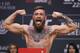 FILE - In this Oct. 5, 2018, file photo, Conor McGregor poses during a ceremonial weigh-in for the UFC 229 mixed martial arts fight in Las Vegas. Nevada fight regulators postponed until next month hearings on suspensions against UFC fighters Conor McGregor and Khabib Nurmagomedov for a brawl after their October match in Las Vegas. (AP Photo/John Locher, file)
