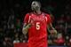 PISCATAWAY, NJ - FEBRUARY 24: Eugene Omoruyi #5 of the Rutgers Scarlet Knights in action against the Minnesota Golden Gophers during a game at Rutgers Athletic Center on February 24, 2019 in Piscataway, New Jersey. (Photo by Rich Schultz/Getty Images)