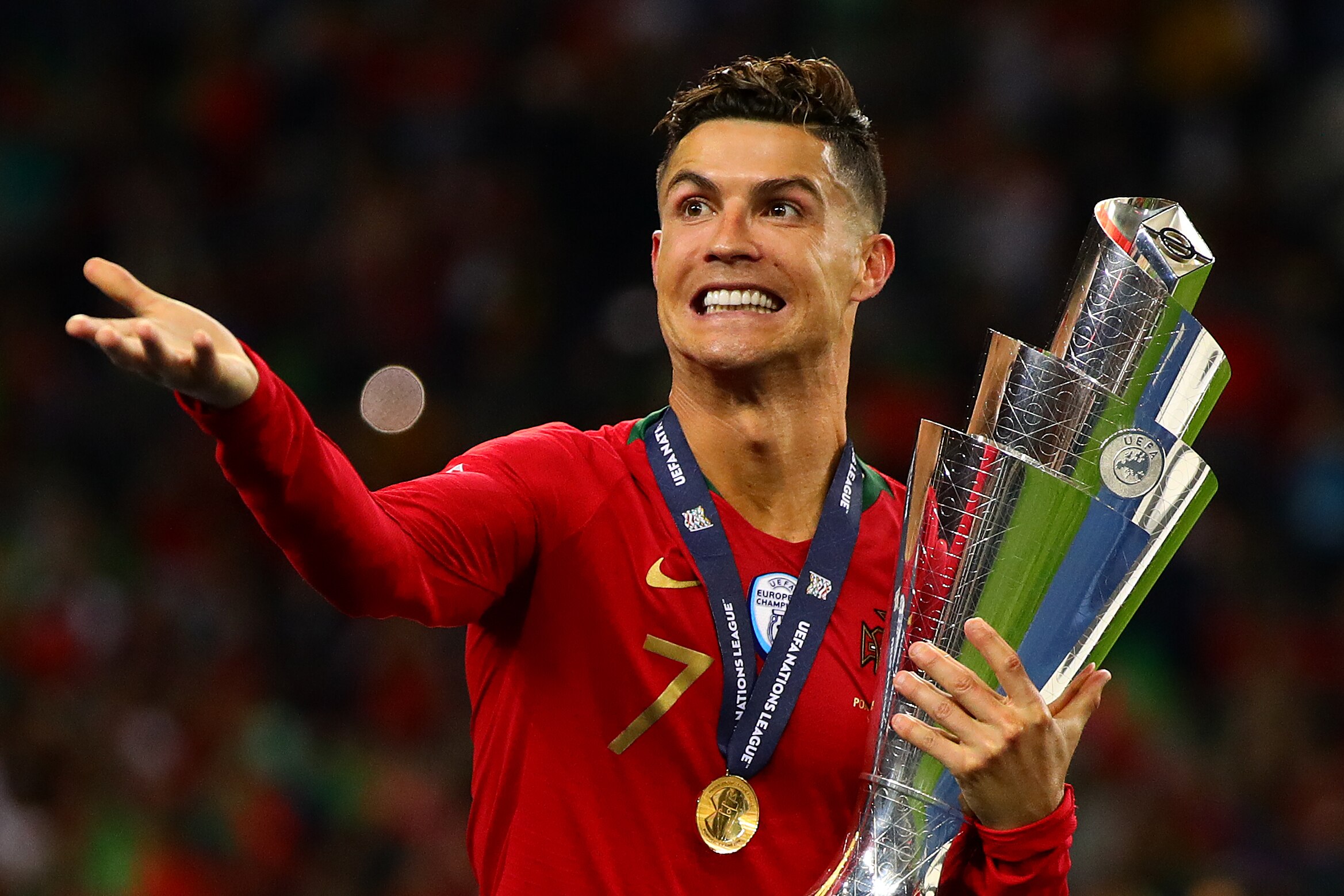 PORTO, PORTUGAL - JUNE 09: Cristiano Ronaldo of Portugal celebrates with the trophy following the UEFA Nations League Final between Portugal and the Netherlands at Estadio do Dragao on June 09, 2019 in Porto, Portugal. (Photo by Chris Brunskill/Fantasista/Getty Images)