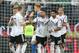 Germany's midfielder Ilkay Gundogan (C) celebrates scoring the 4-0 goal from the penalty spot with his teammates during the UEFA Euro 2020 qualifier Group C football match Germany against Estonia on June 11, 2019 in Mainz. (Photo by Daniel ROLAND / AFP) (Photo credit should read DANIEL ROLAND/AFP/Getty Images)