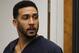 FILE - In this June 15, 2018, file photo, former NFL football player Kellen Winslow Jr., center, leaves his arraignment in Vista, Calif. Winslow, a former NFL No. 1 draft pick and son of a Hall of Famer who starred for his hometown San Diego Chargers, goes on trial Monday, May 20, 2019, on multiple charges including raping two women last year and raping an unconscious 17-year-old girl. He has pleaded not guilty to all charges.(Hayne Palmour/San Diego Union-Tribune via AP, Pool, File)