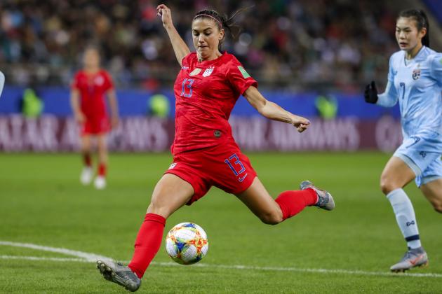 REIMS, FRANCE - JUNE 11: Alex Morgan #13 of USA scores her fifth goal, record tie, during the 2019 FIFA Women's World Cup France group F match between USA and Thailand at Stade Auguste Delaune on June 11, 2019 in Reims, France. (Photo by Catherine Steenkeste/Getty Images)