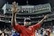 FILE - In this Oct. 10, 2016, file photo, Boston Red Sox's David Ortiz waves from the field at Fenway Park after Game 3 of baseball's American League Division Series against the Cleveland Indians in Boston. Ortiz returned to Boston for medical care after being shot in a bar Sunday, June 9, 2019, in his native Dominican Republic. (AP Photo/Charles Krupa, File)