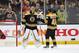 BOSTON, MASSACHUSETTS - MAY 09: Tuukka Rask #40 celebrates with Matt Grzelcyk #48 of the Boston Bruins after defeating the Carolina Hurricanes 5-2 in Game One of the Eastern Conference Final during the 2019 NHL Stanley Cup Playoffs at TD Garden on May 09, 2019 in Boston, Massachusetts. (Photo by Bruce Bennett/Getty Images)