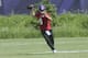 Minnesota Vikings quarterback Kirk Cousins goes through a drill during the NFL football team workouts Tuesday, June 4, 2019, in Eagan, Minn. (AP Photo/Jim Mone)