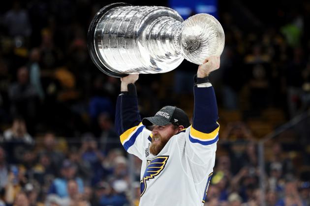 BOSTON, MASSACHUSETTS - JUNE 12:  Ryan O'Reilly #90 of the St. Louis Blues hoists the cup after defeating the Boston Bruins 4-1 to win Game Seven of the 2019 NHL Stanley Cup Final at TD Garden on June 12, 2019 in Boston, Massachusetts. (Photo by Patrick Smith/Getty Images)