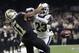 FILE - In this Jan. 20, 2019, file photo, Los Angeles Rams' Nickell Robey-Coleman breaks up a pass intended for New Orleans Saints' Tommylee Lewis during the second half of the NFL football NFC championship game in New Orleans. The non-call on the play involving Rams Nickell Robey-Coleman in the NFC championship game cost the Saints a trip to the Super Bowl. (Or, at least that's how they see it in New Orleans) After taking tons of flak, then admitting the call was wrong, but doing nothing to alter the outcome of the game, the NFL rule-makers met a few months later and declared pass interference would now be reviewable.(AP Photo/Gerald Herbert, File)