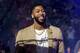 New Orleans Pelicans forward Anthony Davis (23) wears a T-shirt with 'That's All, Folks,' printed on it during player introduction before an NBA basketball game between the New Orleans Pelicans and the Golden State Warriors in New Orleans, Tuesday, April 9, 2019. (AP Photo/Scott Threlkeld)