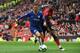 Chelsea's Belgian midfielder Eden Hazard (L) beats Manchester United's French midfielder Paul Pogba (R) during the English Premier League football match between Manchester United and Chelsea at Old Trafford in Manchester, north west England, on April 28, 2019. (Photo by Paul ELLIS / AFP) / RESTRICTED TO EDITORIAL USE. No use with unauthorized audio, video, data, fixture lists, club/league logos or 'live' services. Online in-match use limited to 120 images. An additional 40 images may be used in extra time. No video emulation. Social media in-match use limited to 120 images. An additional 40 images may be used in extra time. No use in betting publications, games or single club/league/player publications. / (Photo credit should read PAUL ELLIS/AFP/Getty Images)