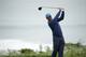 Tiger Woods watches his tee shot on the 11th hole during the second round of the U.S. Open Championship golf tournament Friday, June 14, 2019, in Pebble Beach, Calif. (AP Photo/Marcio Jose Sanchez)
