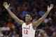 Virginia's De'Andre Hunter (12) reacts after making a basket against North Carolina State during the second half of an NCAA college basketball game in the Atlantic Coast Conference tournament in Charlotte, N.C., Thursday, March 14, 2019. (AP Photo/Chuck Burton)