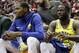 Golden State Warriors' Kevin Durant, left, and Draymond Green sit on the bench during the first half of an NBA basketball game against the Houston Rockets Thursday, Nov. 15, 2018, in Houston. (AP Photo/David J. Phillip)