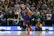 Los Angeles Lakers guard Lonzo Ball (2) brings the ball up court during the first half of an NBA basketball game against the Utah Jazz Friday, Jan. 11, 2019, in Salt Lake City. (AP Photo/Rick Bowmer)
