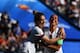 United States' forward Carli Lloyd (R) celebrates with teammates after scoring a goal during the France 2019 Women's World Cup Group F football match between USA and Chile, on June 16, 2019, at the Parc des Princes stadium in Paris. (Photo by FRANCK FIFE / AFP) (Photo credit should read FRANCK FIFE/AFP/Getty Images)