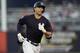 New York Yankees' Giancarlo Stanton runs around the bases after his home run off Philadelphia Phillies starting pitcher Jerad Eickhoff during the third inning of a spring training baseball game Friday, March 22, 2019, in Tampa, Fla. (AP Photo/Chris O'Meara)